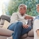 Man and woman on couch having conversation